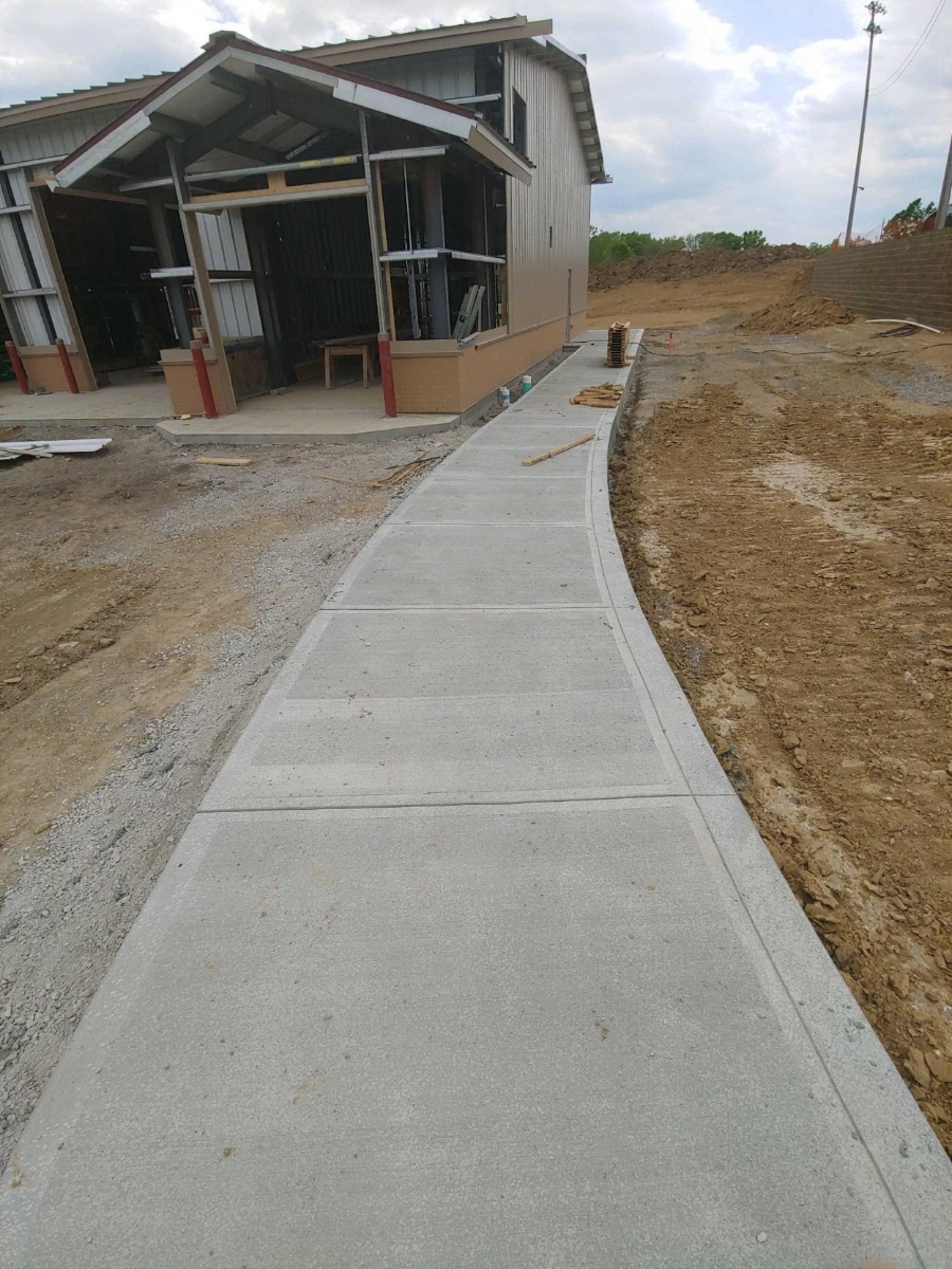 finished sidewalk on a new construction site